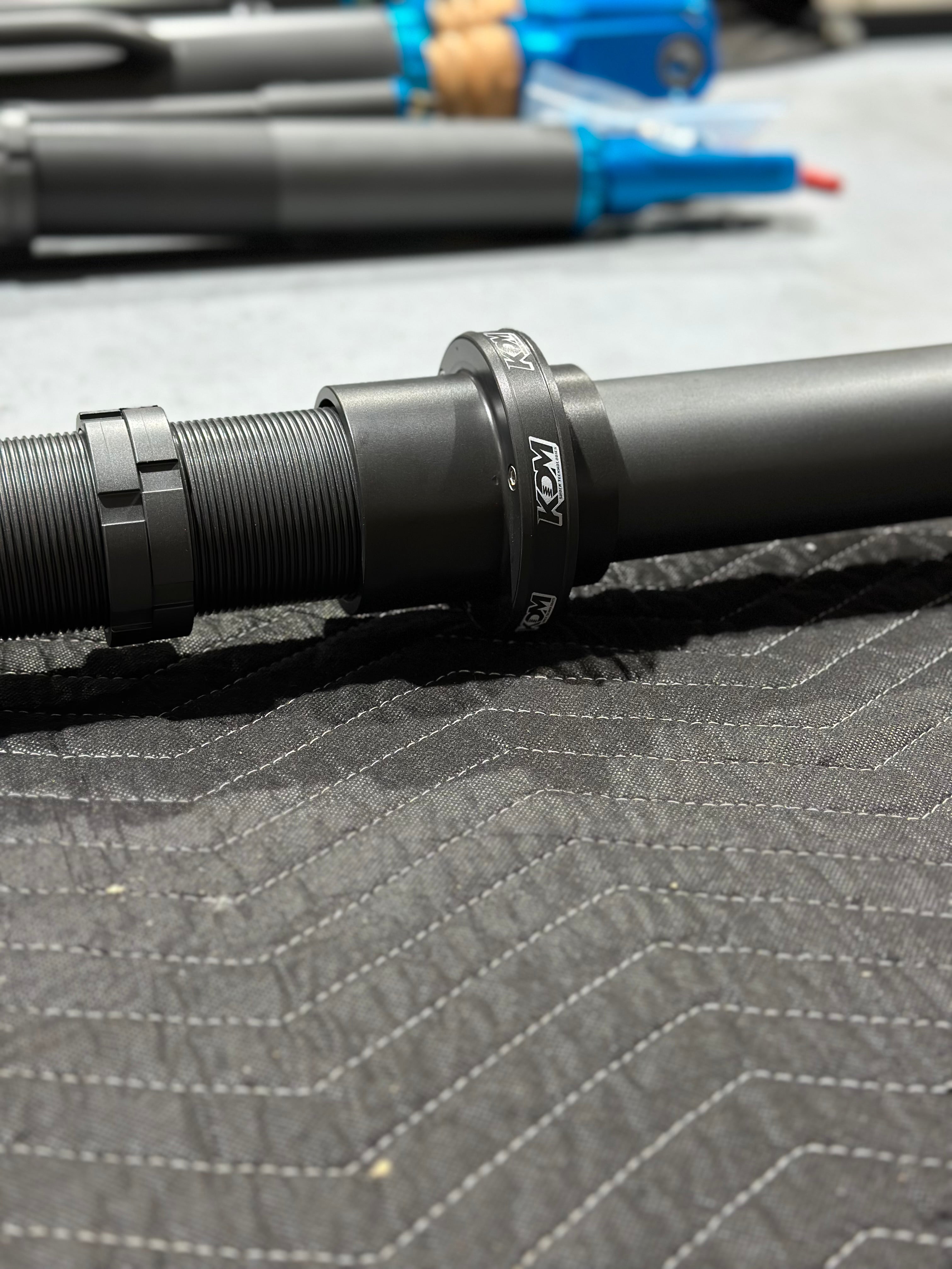KDM's Three-Piece Billet Spring Dividers Are a Game Changer for 2.5 and 3.0 Coilover Shocks